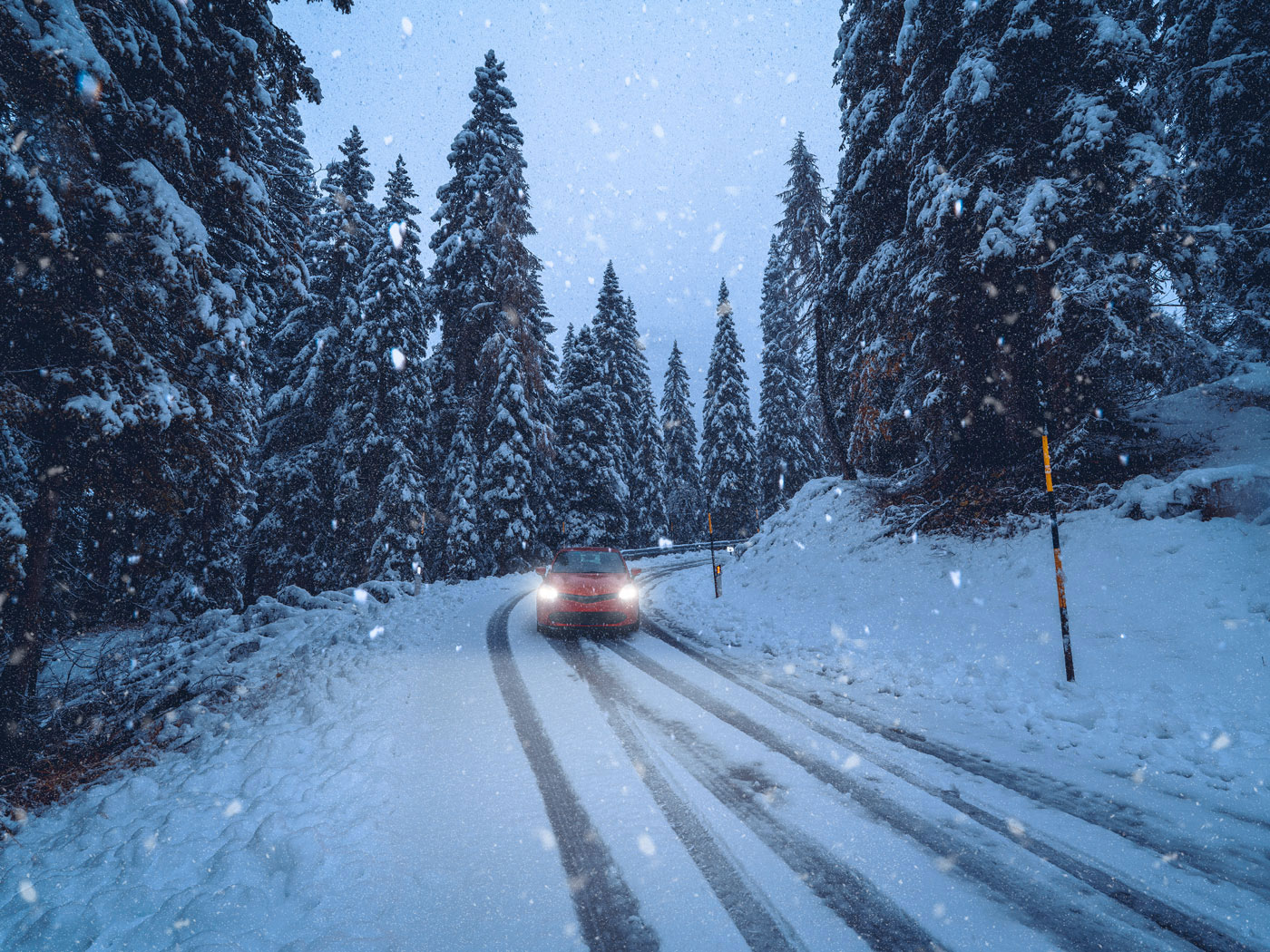 Car driving in hail