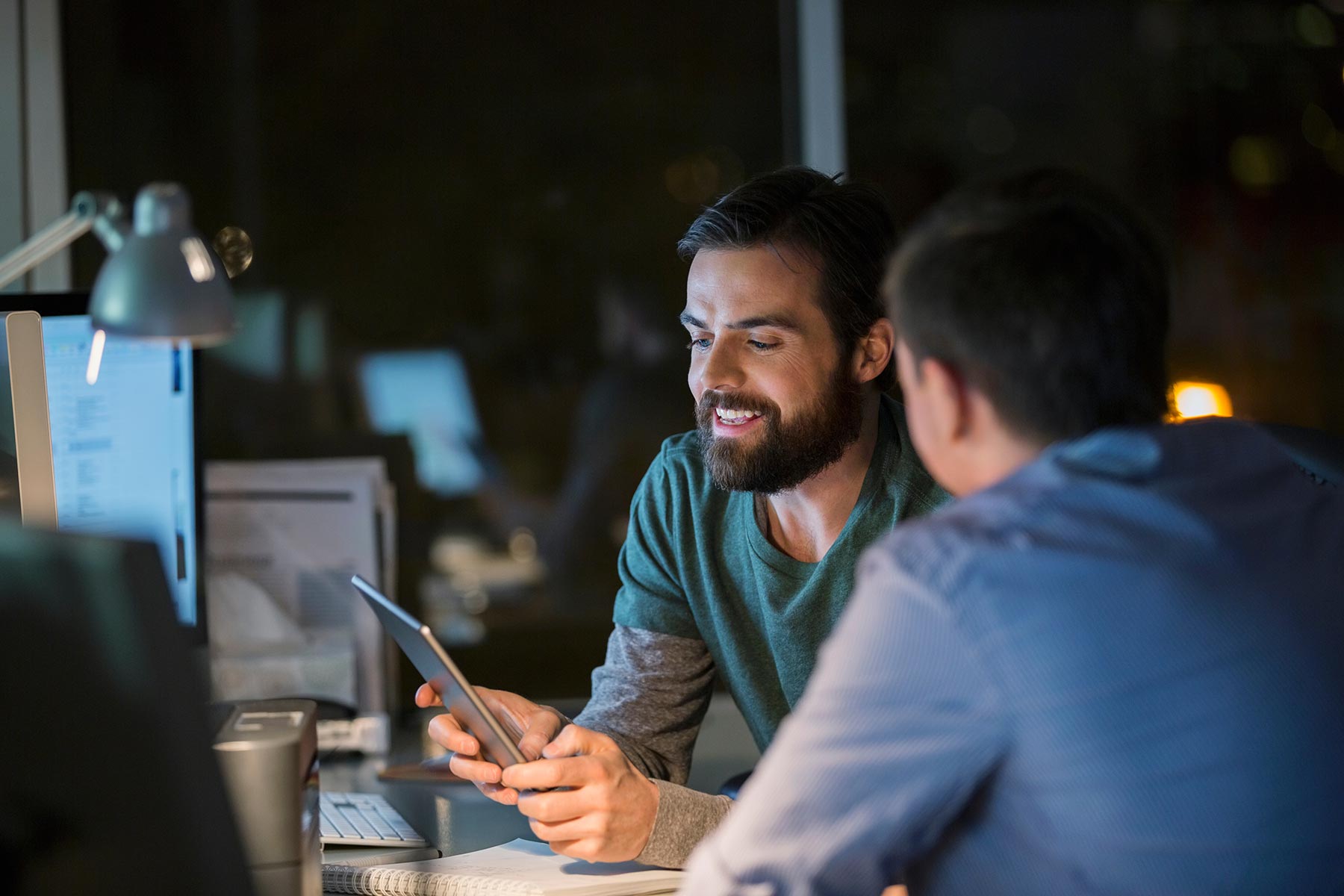 hero-men-working-ipad-shutterstock_offset_2215698301