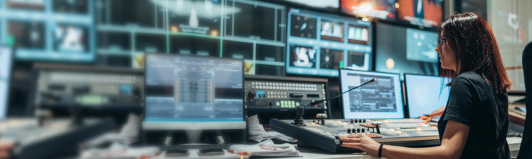 hero-woman-media-control-room-shutterstock_2060979917