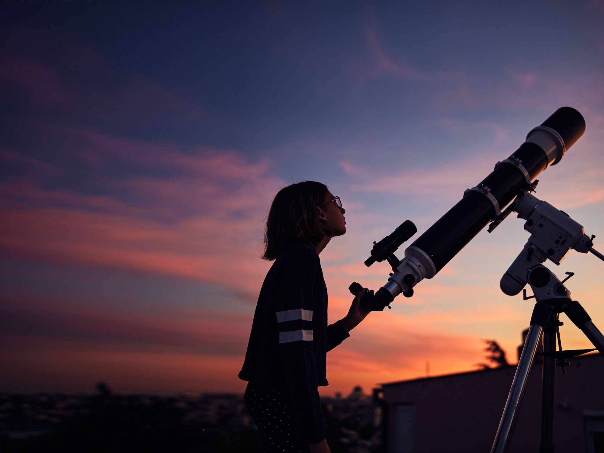 horizontal-tab-girl-stargazing-telescope-shutterstock_2133743475