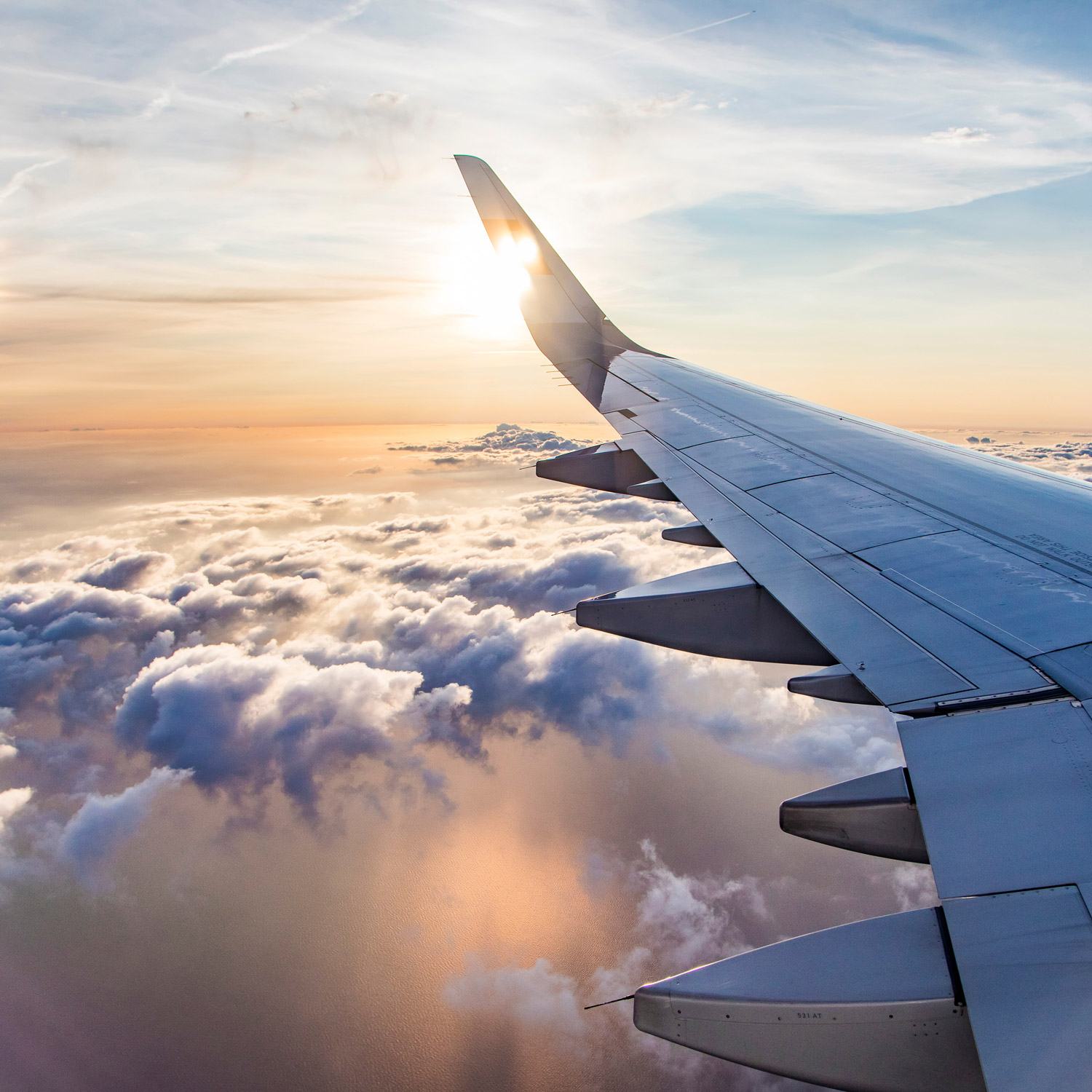 thumb-aviation-airplane-wing-sky-clouds-shutterstock_1020928975