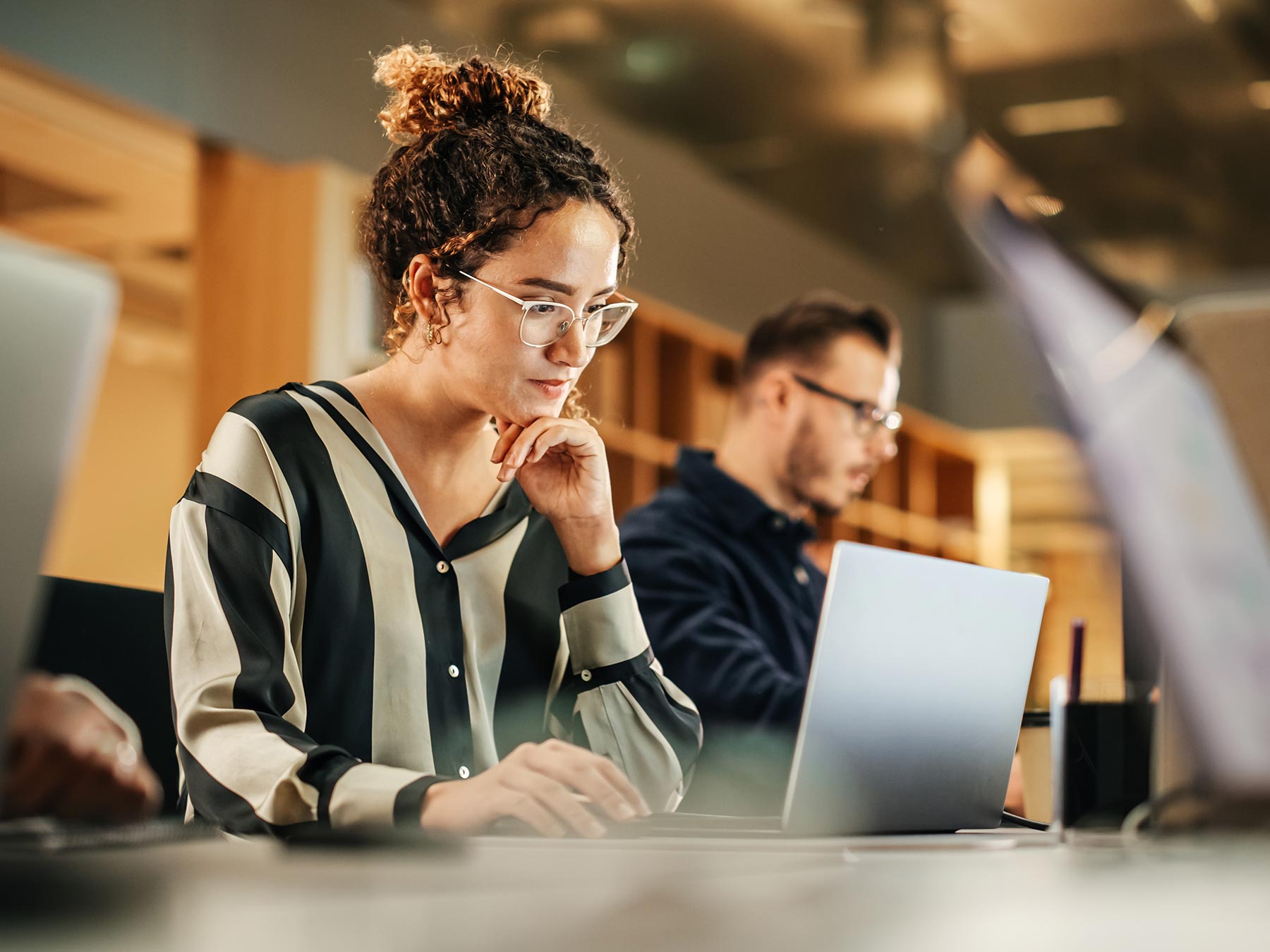 woman-at-work-on-laptop-shutterstock_2242410029