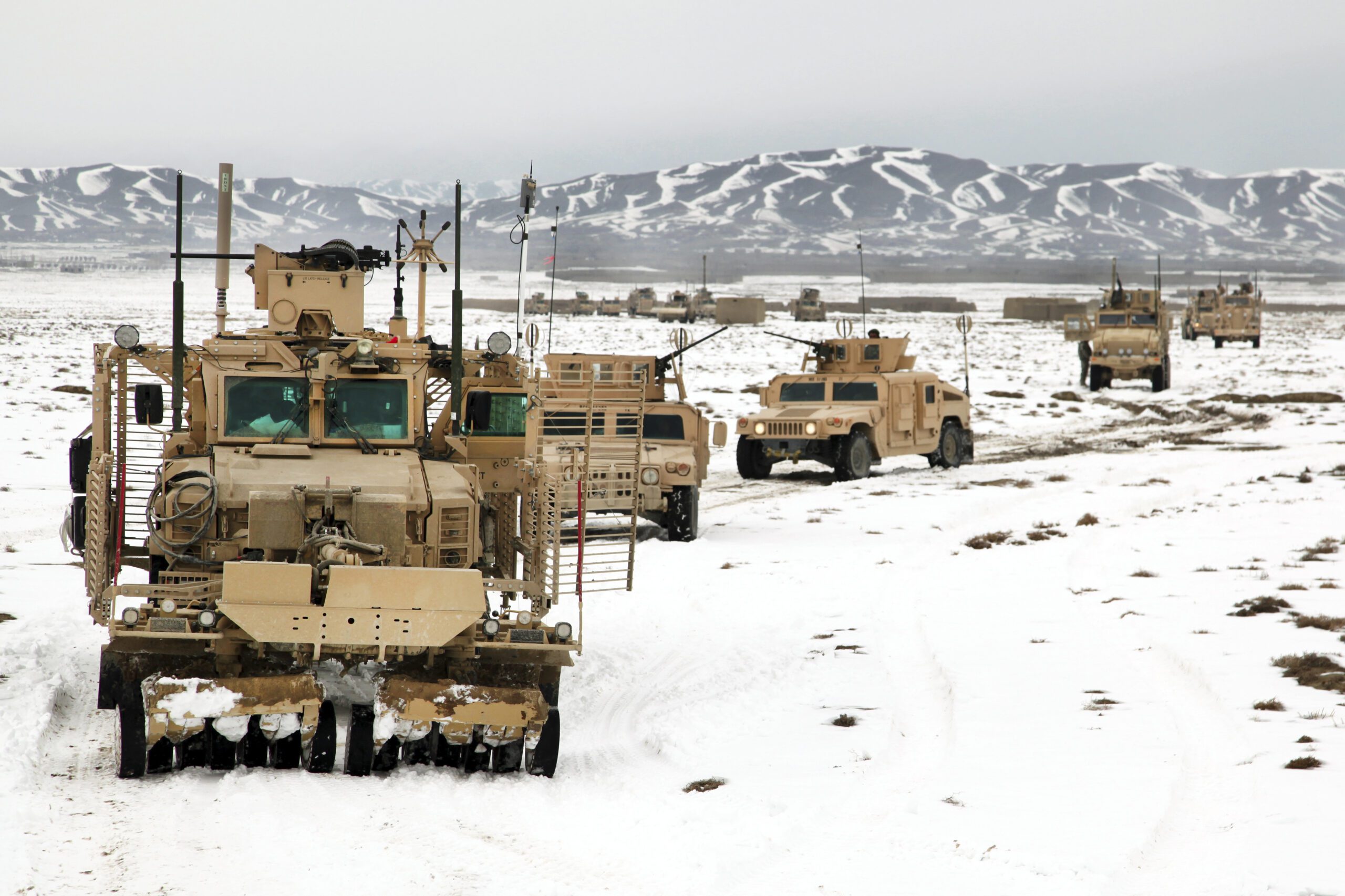 A convoy of vehicles during a route clearing procedure in Afghanistan.
