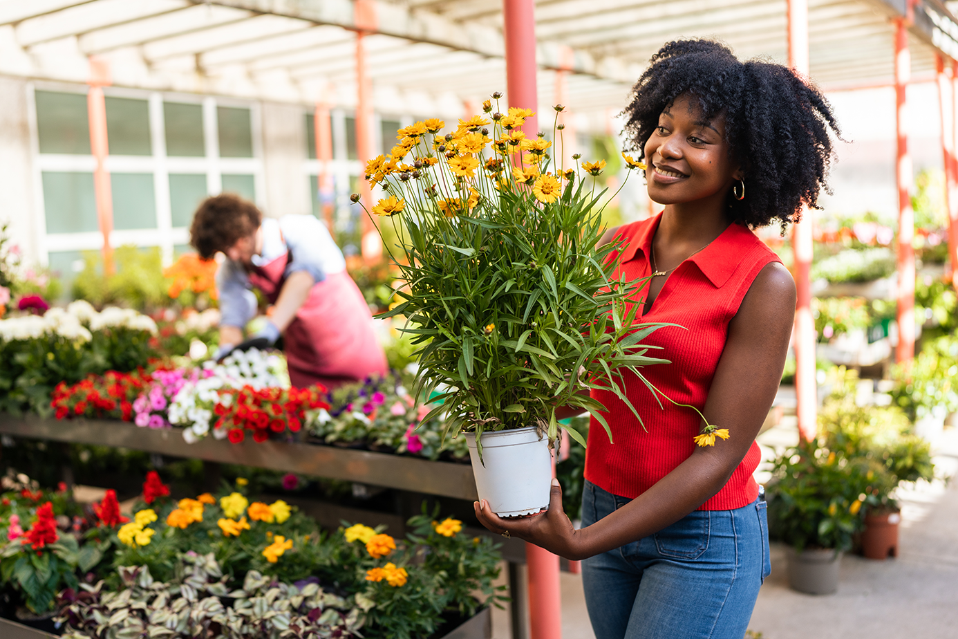 Woman shopping for flowers in a market