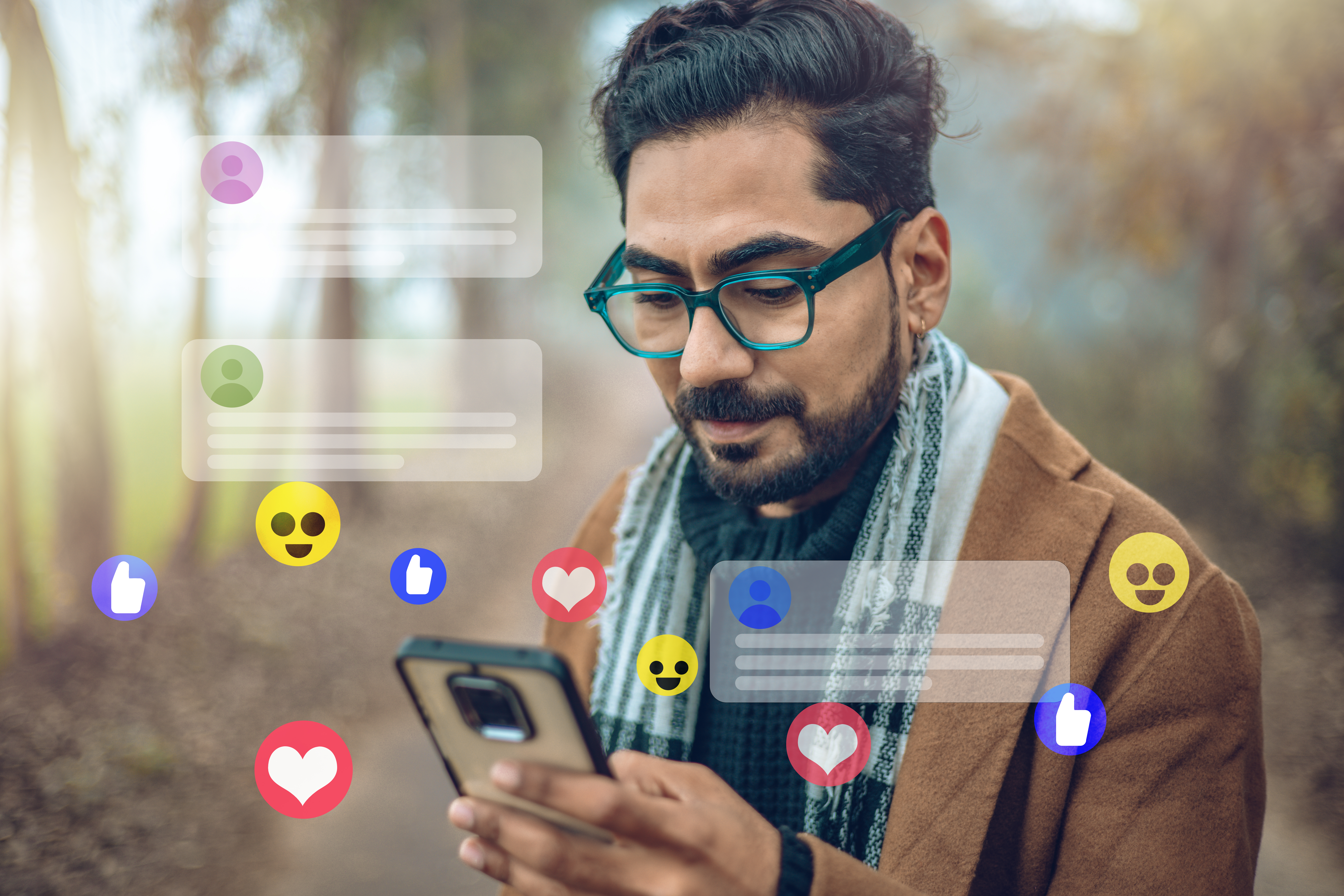 A man is using his smartphone to browse social media, engage with notifications, and reply to posts.