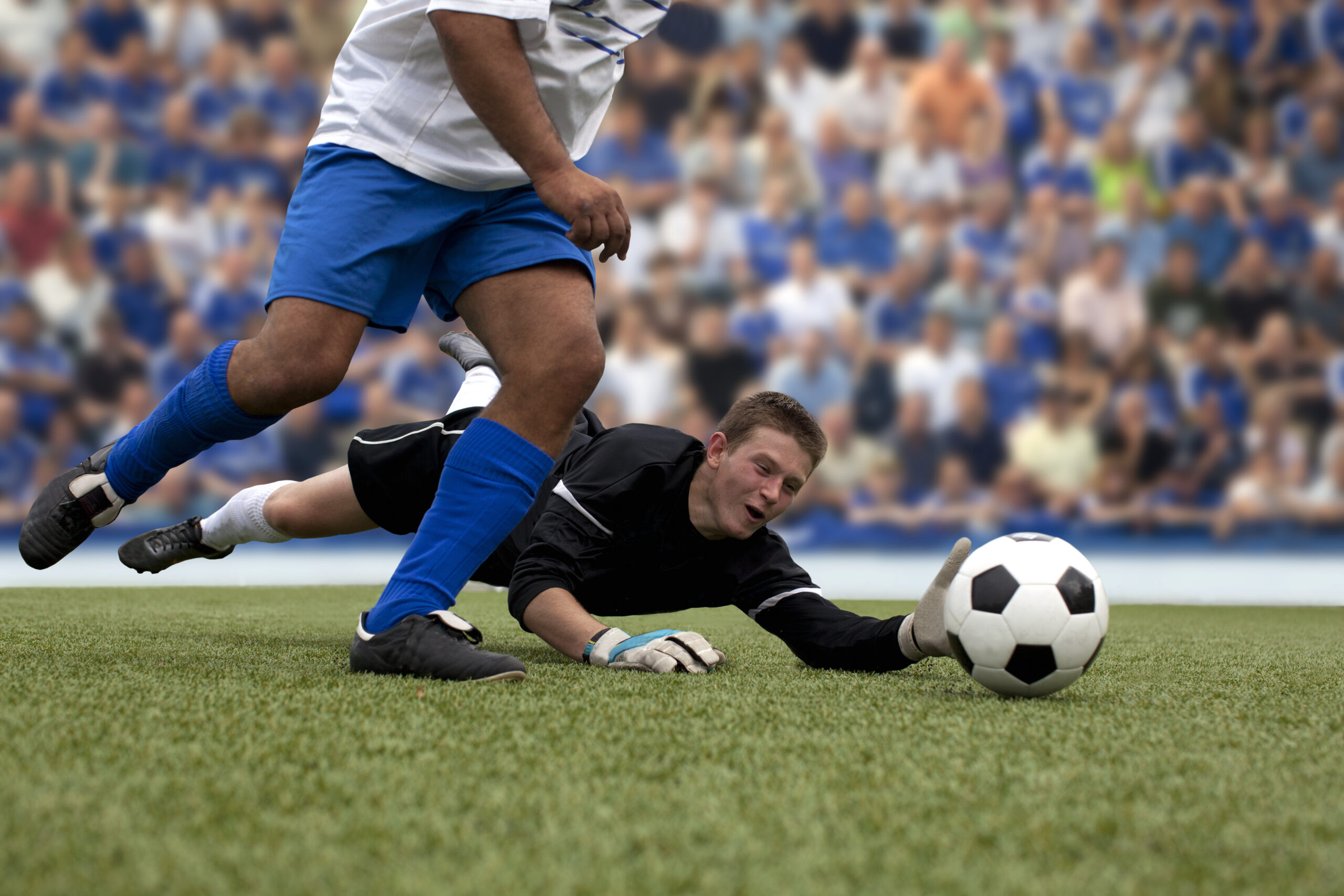Soccer goalkeeper defending a goal.