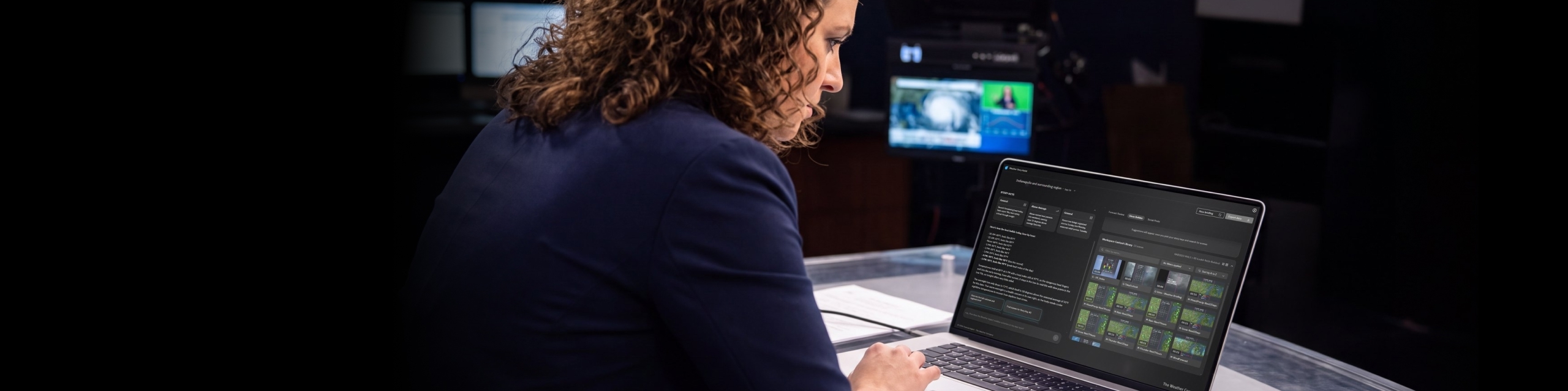 A broadcast meteorologist using Weather Story Assist on her computer to make content.